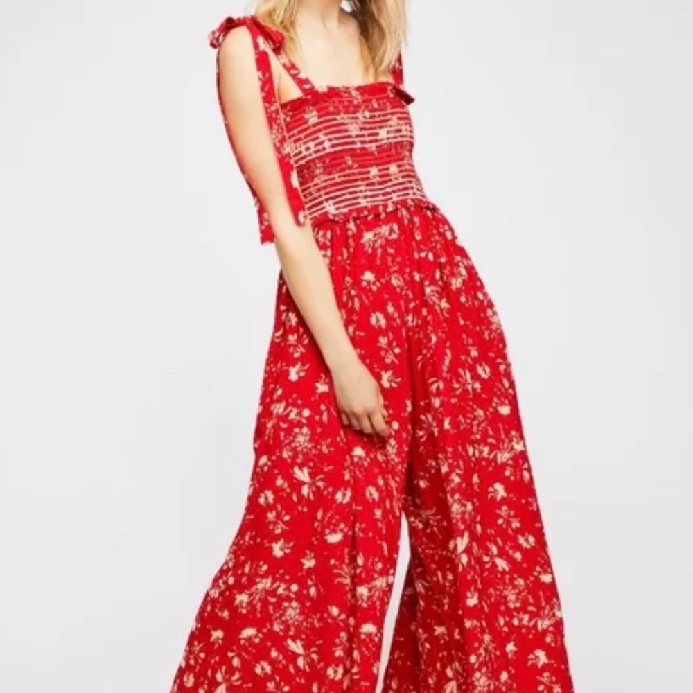 Red floral free people jumpsuit